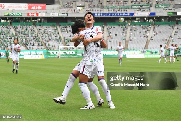 Satoki Uejo and Hiroki Yamamoto of Fagiano Okayama celebrate the second goal during the J.League Meiji Yasuda J2 33rd Sec. Match between Tokyo Verdy...