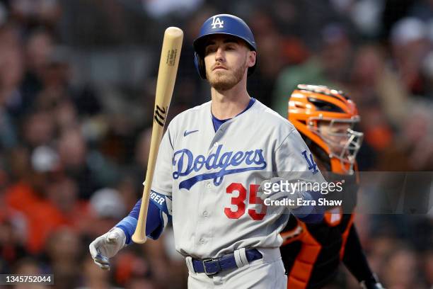 Cody Bellinger of the Los Angeles Dodgers reacts after striking out in the second inning against the San Francisco Giants during Game 2 of the...