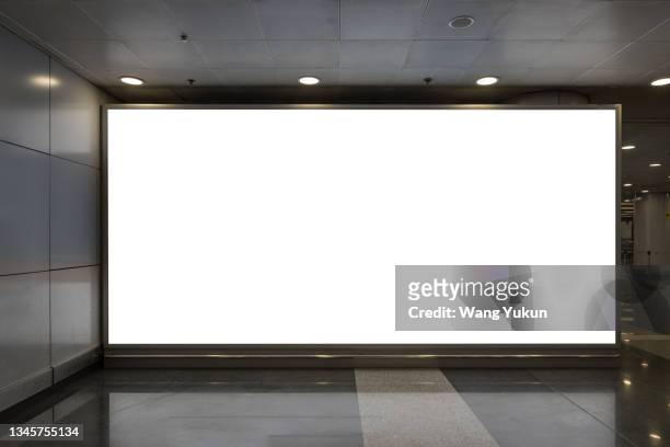 blank big screen billboard at the airport - placard stock-fotos und bilder