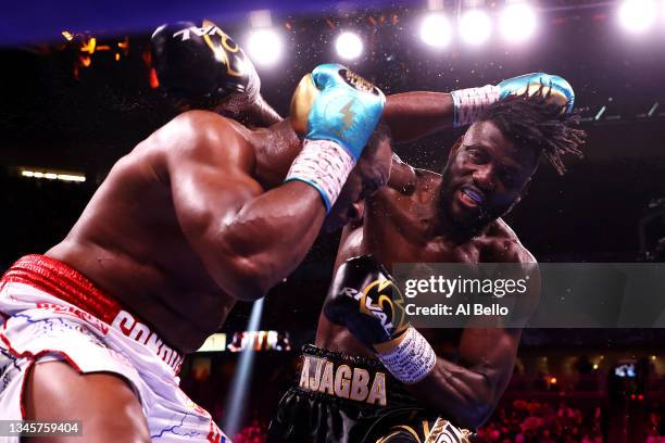 Efe Ajagba and Frank Sanchez exchange punches during their heavyweight bout at T-Mobile Arena on October 09, 2021 in Las Vegas, Nevada.