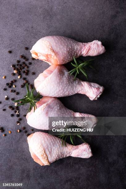 raw chicken legs drumsticks, chicken meat with ingredients for cooking, top view - chicken thighs stock pictures, royalty-free photos & images