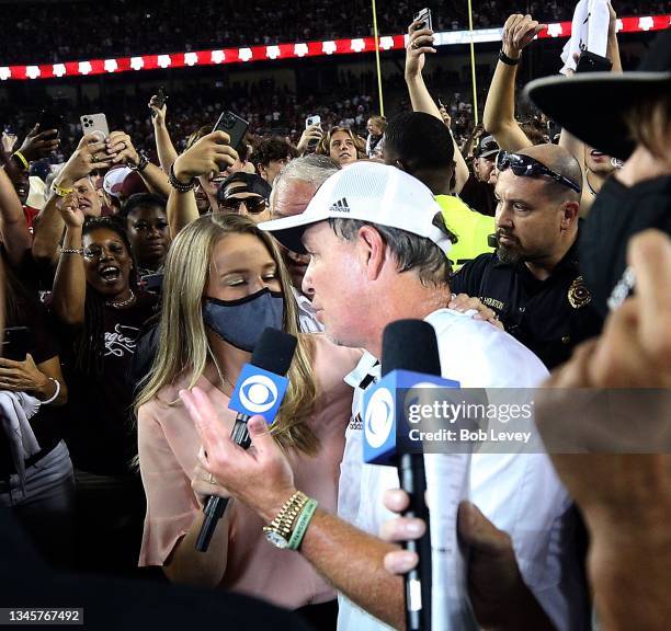 Head coach Jimbo Fisher of the Texas A&M Aggies is interviewed after defeating the Alabama Crimson Tide 41-38 at Kyle Field on October 09, 2021 in...
