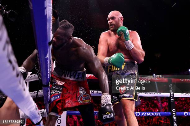 Deontay Wilder is knocked out by Tyson Fury in the 11th round during their WBC heavyweight title fight at T-Mobile Arena on October 09, 2021 in Las...