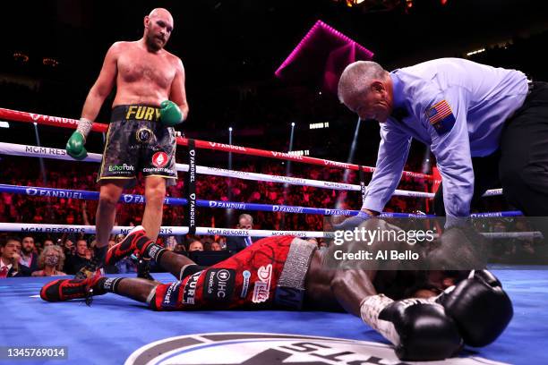 Tyson Fury knocks out Deontay Wilder in the 11th round during their WBC heavyweight title fight at T-Mobile Arena on October 09, 2021 in Las Vegas,...