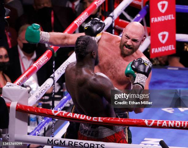 Tyson Fury knocks out Deontay Wilder in the 11th round of their WBC heavyweight title fight at T-Mobile Arena on October 9, 2021 in Las Vegas, Nevada.
