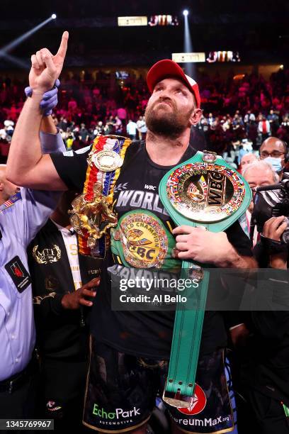 Tyson Fury celebrates his 11th round knock out win against Deontay Wilder after their WBC heavyweight title fight at T-Mobile Arena on October 09,...