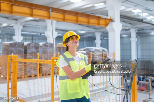 crane operator working in factory - overhead crane stock pictures, royalty-free photos & images