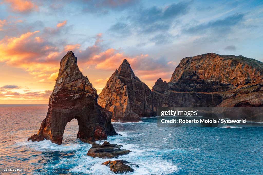 Waves crashing on sea stacks rocks, Madeira island