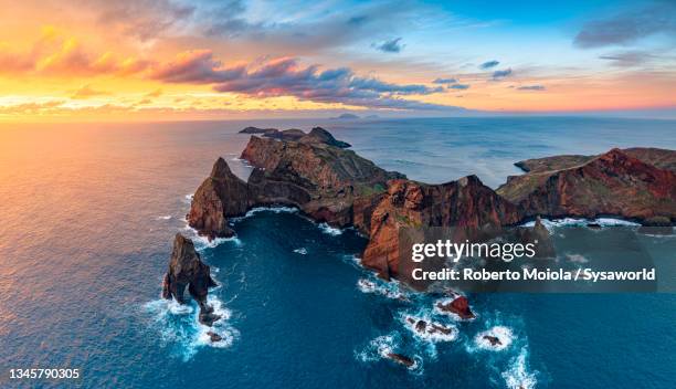 sunrise over cliffs by the ocean, aerial view, madeira - wonderlust fotografías e imágenes de stock