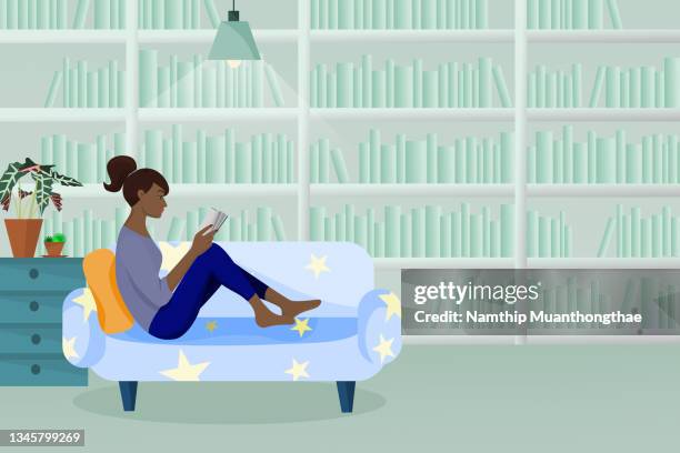 a library illustration concept shows a dark woman is reading a book and sitting on the warm sofa in the library that decorated like a home. - concentration stock illustrations stock pictures, royalty-free photos & images