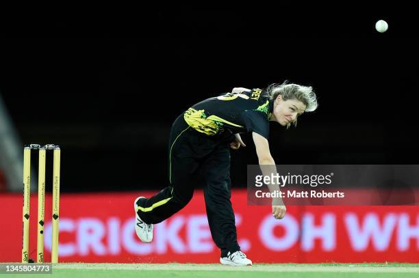 Nicola Carey of Australia bowls during game three of the International Women's T20 series between Australia and India at Metricon Stadium on October...