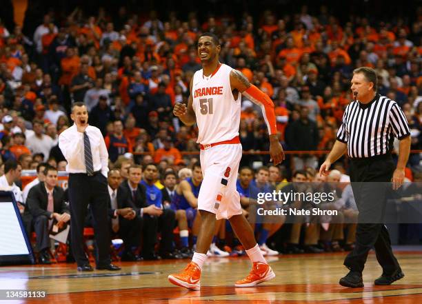 Fab Melo of the Syracuse Orange limps off the court during the game against the Florida Gators during the game at the Carrier Dome on December 2,...