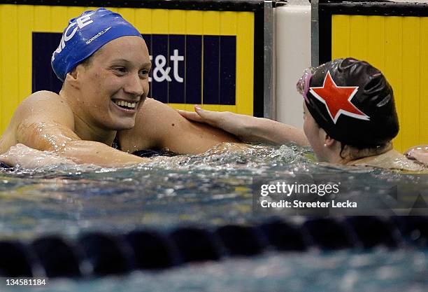 Camille Muffat of France smiles after defeating Melissa Franklin in the women's 200m freestyle finals during the 2011 AT&T Winter National...