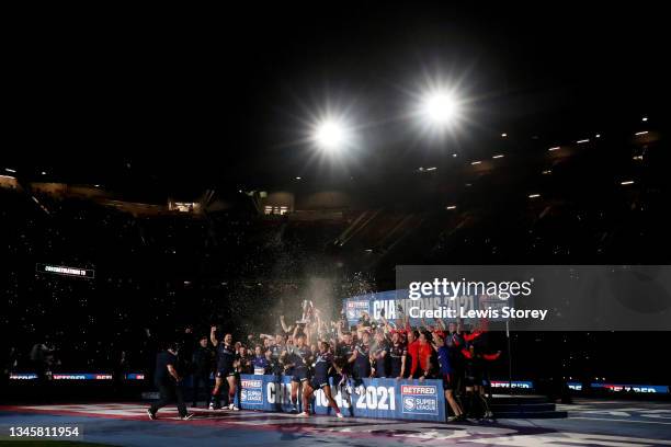 James Roby of St Helens lifts the Grand Final Trophy and celebrates victory with their team mates during the Betfred Super League Grand Final match...