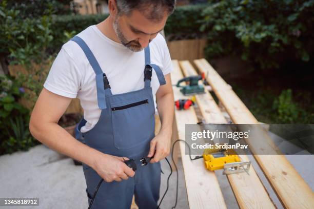 110 Plugging In Appliance Stock Photos, High-Res Pictures, and Images ...