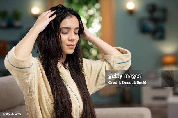 young woman hair care, stock photo - massajar imagens e fotografias de stock