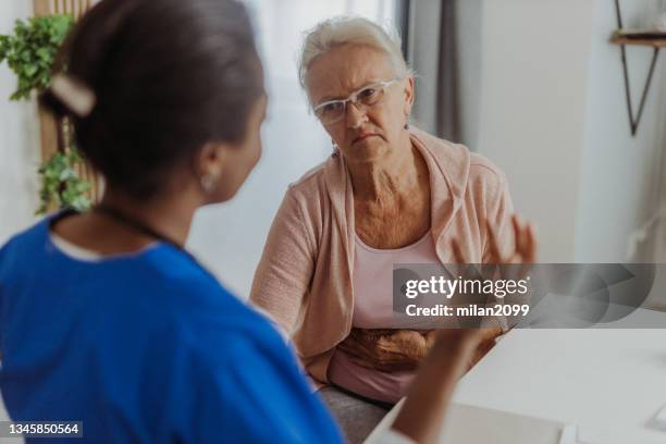 doctor visit - stomach cancer stock pictures, royalty-free photos & images