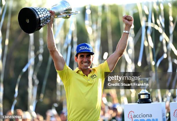 Rafa Cabrera-Bello of Spain celebrates with the winners trophy after the final round of The Open de Espana at Club de Campo Villa de Madrid on...