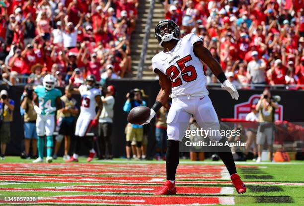 Giovani Bernard of the Tampa Bay Buccaneers celebrates a 10-yard touchdown pass from Tom Brady \npagainst the Miami Dolphins during the first quarter...