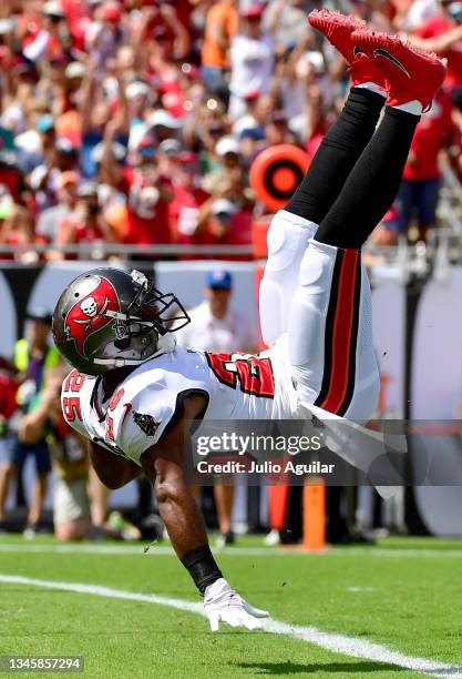 Giovani Bernard of the Tampa Bay Buccaneers scores on a 10-yard touchdown pass from Tom Brady against the Miami Dolphins during the first quarter at...