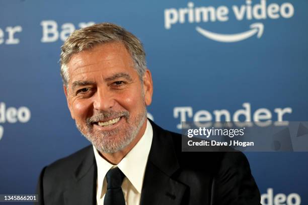George Clooney attends a photocall for "The Tender Bar" during the 65th BFI London Film Festival at NoMad London on October 10, 2021 in London,...