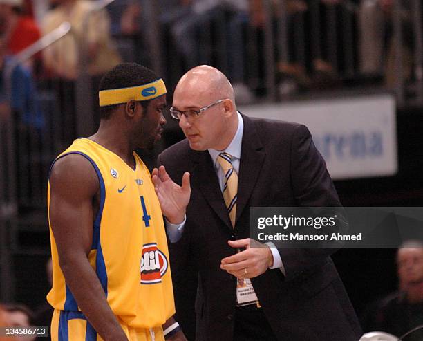 Coach of Macabbi Tel Avic Neven Spahija talks a play over with guard Will Bynum during the NBA Europe Live Tour presented by EA Sports on October 10,...