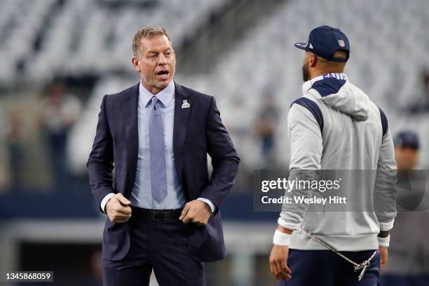 Tory Aikman talks with Dak Prescott of the Dallas Cowboys before the game against the New York Giants at AT&T Stadium on October 10, 2021 in...