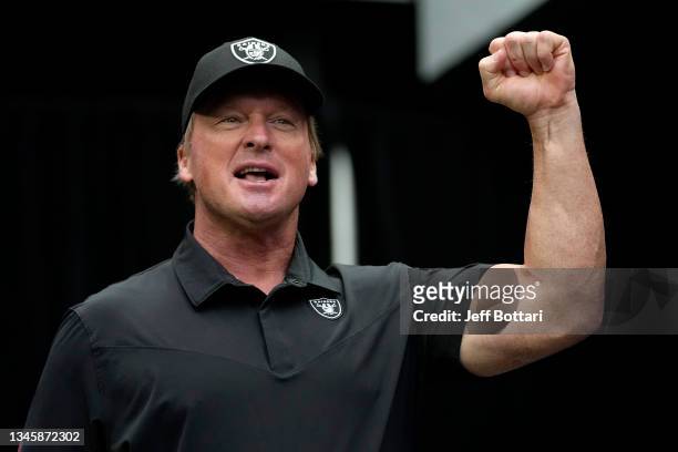 Head coach John Gruden of the Las Vegas Raiders reacts before a game against the Chicago Bears at Allegiant Stadium on October 10, 2021 in Las Vegas,...