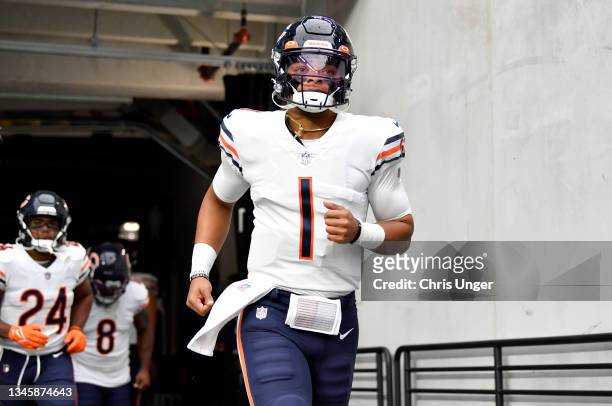 Justin Fields of the Chicago Bears takes to the field before a game against the Las Vegas Raiders at Allegiant Stadium on October 10, 2021 in Las...