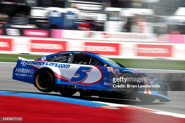 Kyle Larson, driver of the HendrickCars.com Chevrolet, drives during the NASCAR Cup Series Bank of America ROVAL 400 at Charlotte Motor Speedway on...
