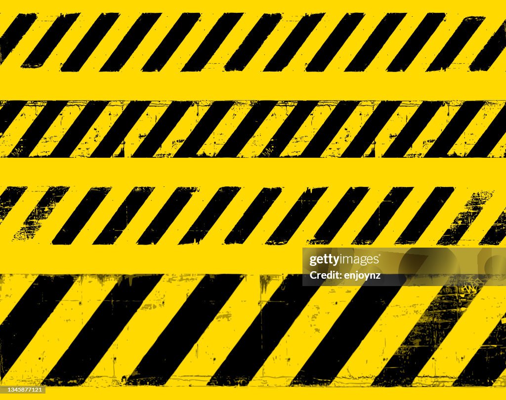 Yellow grunge warning sign lines symbol