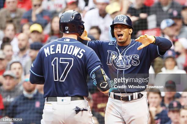 Austin Meadows celebrates with Wander Franco of the Tampa Bay Rays after his two-run homerun in the first inning against the Boston Red Sox during...