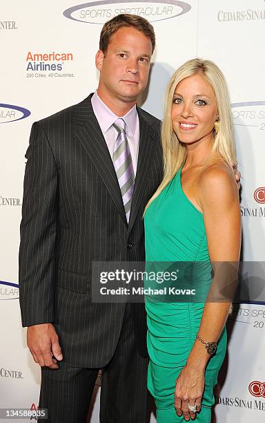 Trojans head football coach Lane Kiffin and wife Layla Kiffin arrive at the 26th Anniversary Sports Spectacular at the Hyatt Regency Century Plaza on...