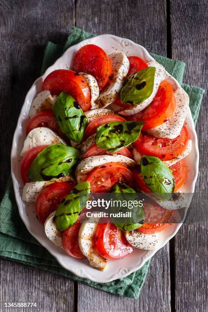 caprese salad - caprese salad stock pictures, royalty-free photos & images