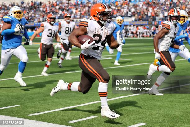 Nick Chubb of the Cleveland Browns breaks through to run for a touchdown during the third quarter against the Los Angeles Chargers at SoFi Stadium on...
