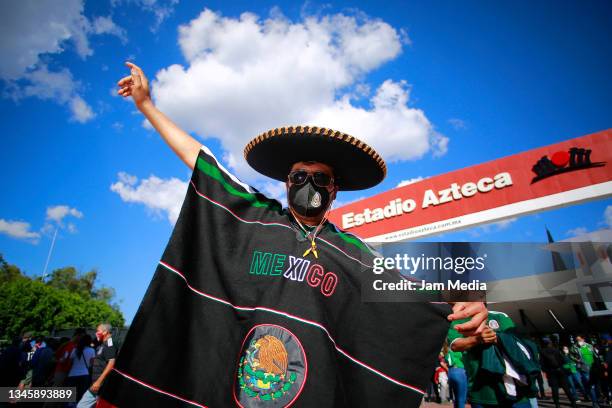 Fan of Mexico poses outside the stadium prior to the match between Mexico and Honduras as part of the Concacaf 2022 FIFA World Cup Qualifier at...