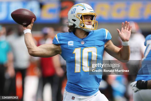 Justin Herbert of the Los Angeles Chargers throws the ball during the first quarter against the Cleveland Browns at SoFi Stadium on October 10, 2021...