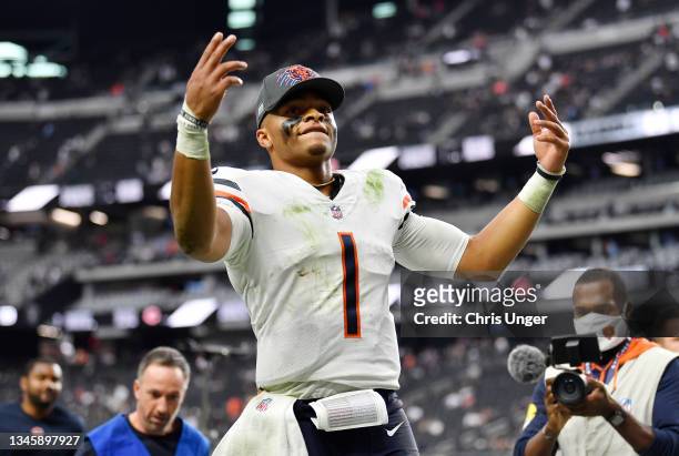 Justin Fields of the Chicago Bears celebrates a win against the Las Vegas Raiders at Allegiant Stadium on October 10, 2021 in Las Vegas, Nevada.