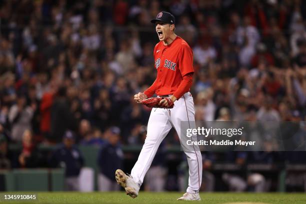 Nick Pivetta of the Boston Red Sox celebrates striking out Mike Zunino of the Tampa Bay Rays in the 13th inning during Game 3 of the American League...