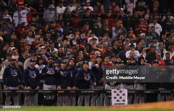 The Tampa Bay Rays bench reacts to a double by Kevin Kiermaier of the Tampa Bay Rays in the 13th inning against the Boston Red Sox during Game 3 of...