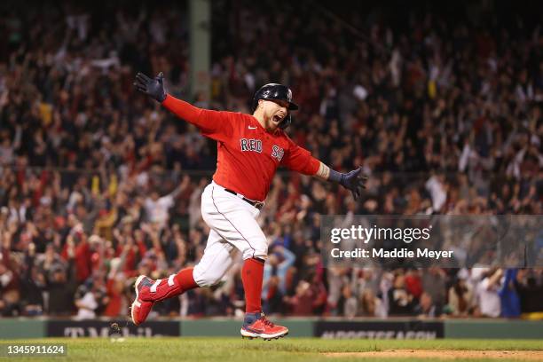 Christian Vazquez of the Boston Red Sox celebrates his game winning two-run homerun in the 13th inning against the Tampa Bay Rays during Game 3 of...