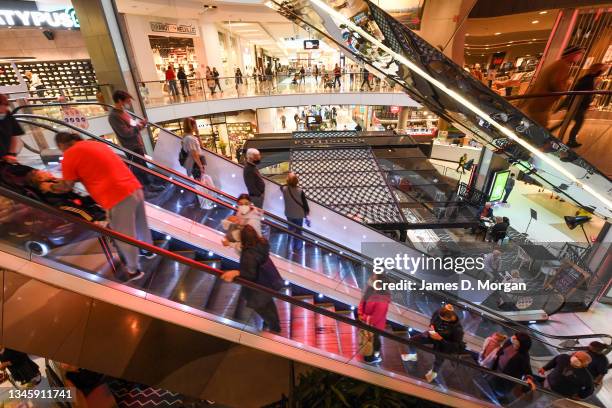 Customers visiting Westfield Bondi Junction on October 11, 2021 in Sydney, Australia. Westfield today welcomed back more customers and businesses...