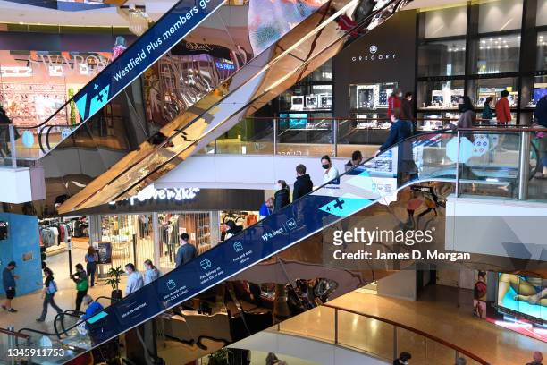 Customers visiting Westfield Bondi Junction on October 11, 2021 in Sydney, Australia. Westfield today welcomed back more customers and businesses...