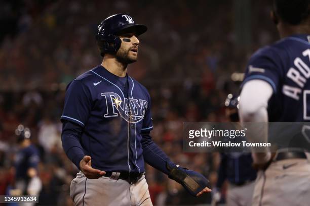 Kevin Kiermaier of the Tampa Bay Rays reacts after his ground rule double in the 13th inning against the Boston Red Sox during Game 3 of the American...