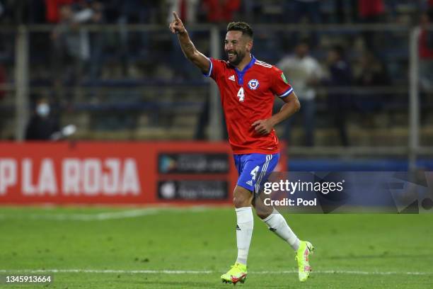 Mauricio Isla of Chile celebrates after scoring the second goal of his team during a match between Chile and Paraguay as part of South American...