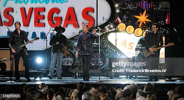 JoeDon Rooney , Gary LeVox, and Jay DeMarcus of the Band Rascal Flattas perform at the 44th Annual CMA Awards at the Bridgestone Arena on November...