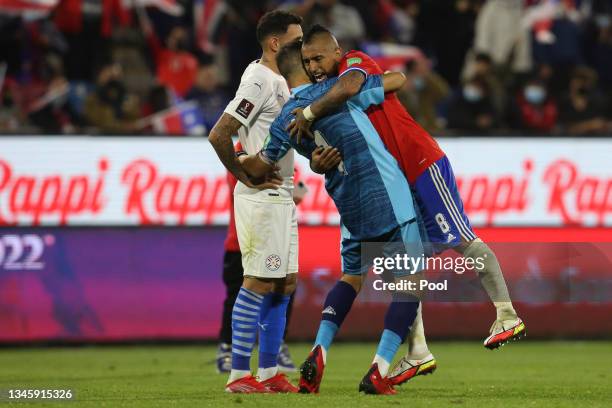 Arturo Vidal of Chile and Claudio Bravo of Chile celebrate after a match between Chile and Paraguay as part of South American Qualifiers for Qatar...