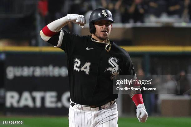 Yasmani Grandal of the Chicago White Sox hits a two run home run in the third inning during game 3 of the American League Division Series against the...