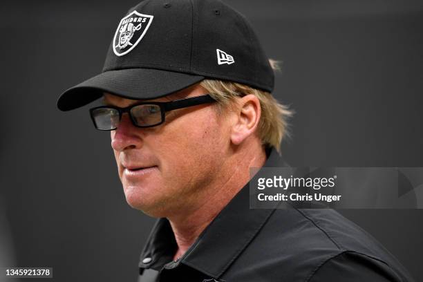 Head coach Jon Gruden of the Las Vegas Raiders walks onto the field before a game against the Chicago Bears at Allegiant Stadium on October 10, 2021...