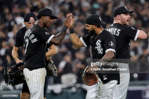 Leury Garcia and Tim Anderson of the Chicago White Sox celebrate a win over the Houston Astros in game 3 of the American League Division Series at...